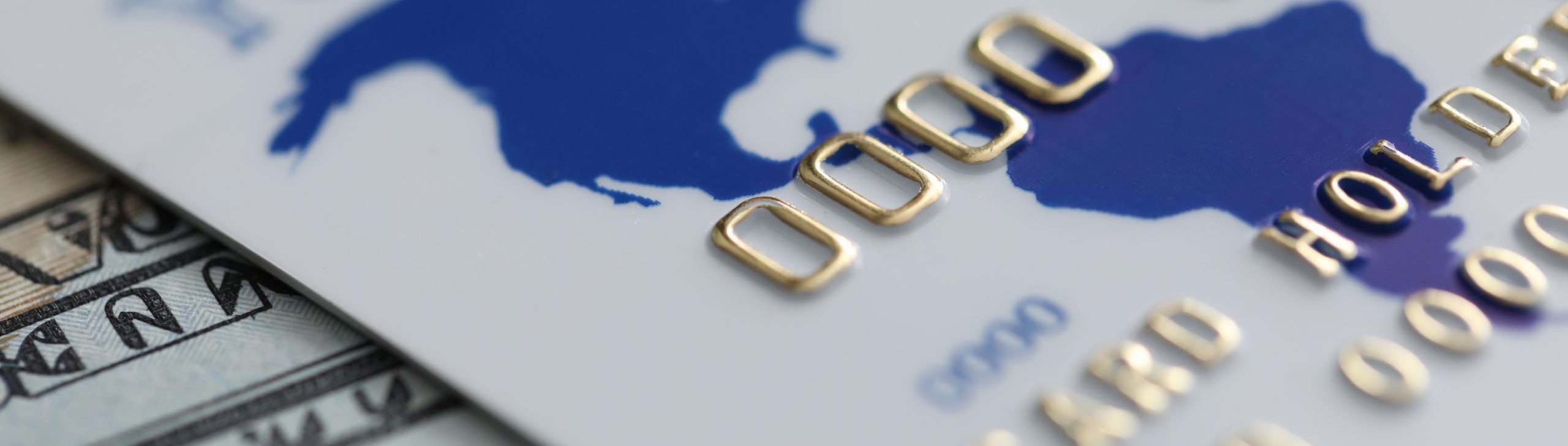 closeup of a credit card and American currency
