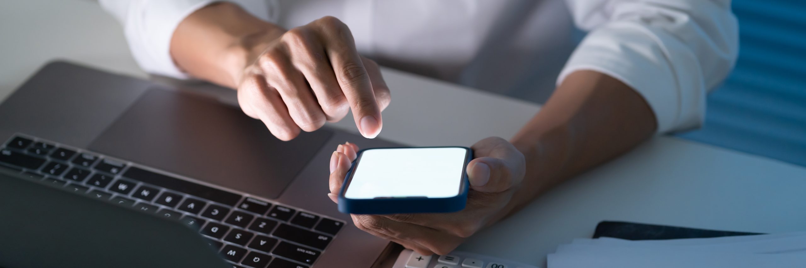 business man holding smartphone
